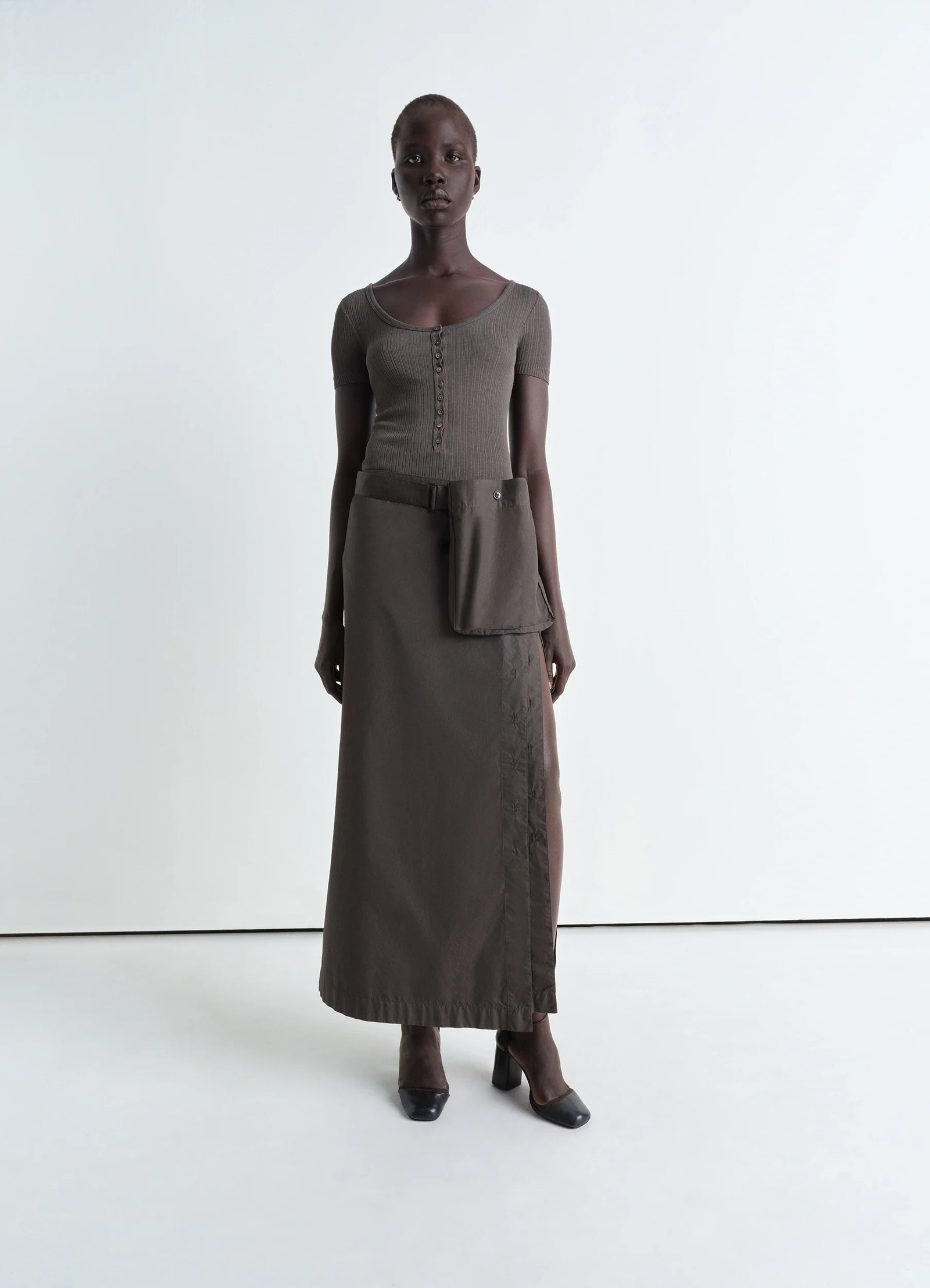Lemaire buttoned long skirt in garment dyed cotton poplin, model shot, front view adjustable fit with pocket