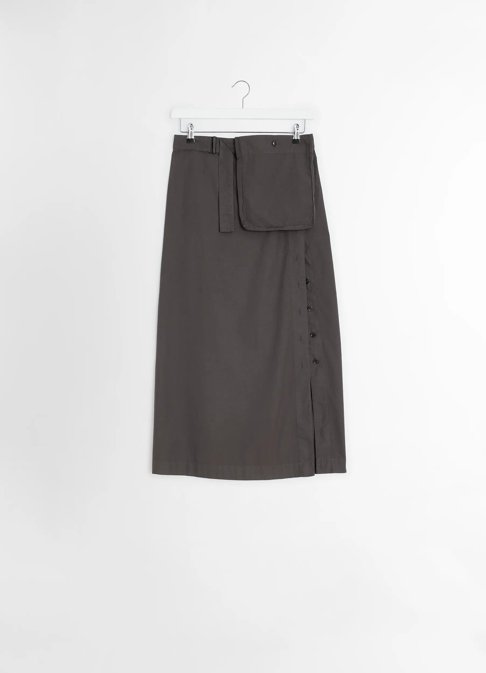 Lemaire buttoned long skirt in garment dyed cotton poplin, product shot, top angle view belted pocket flap detail