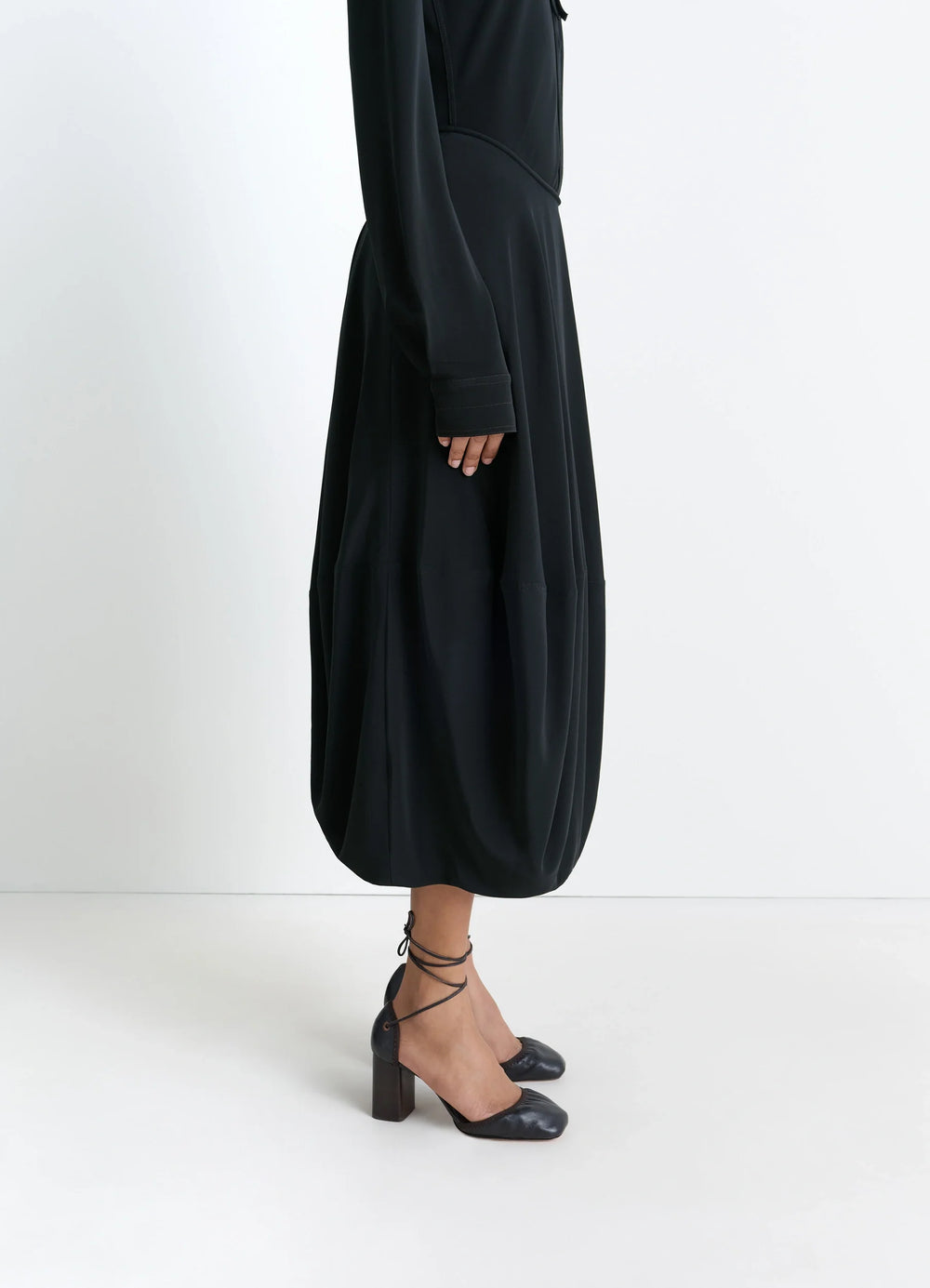 Balloon Skirt in Silk Crepe de Chine, model shot, three-quarter view balloon hemline drape