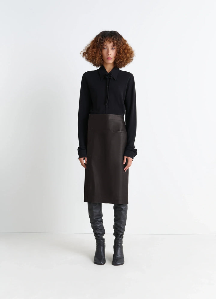 Lemaire Leather Wrapover Skirt in Supple Cow Leather, model shot, Front view Wrapover with snap closure