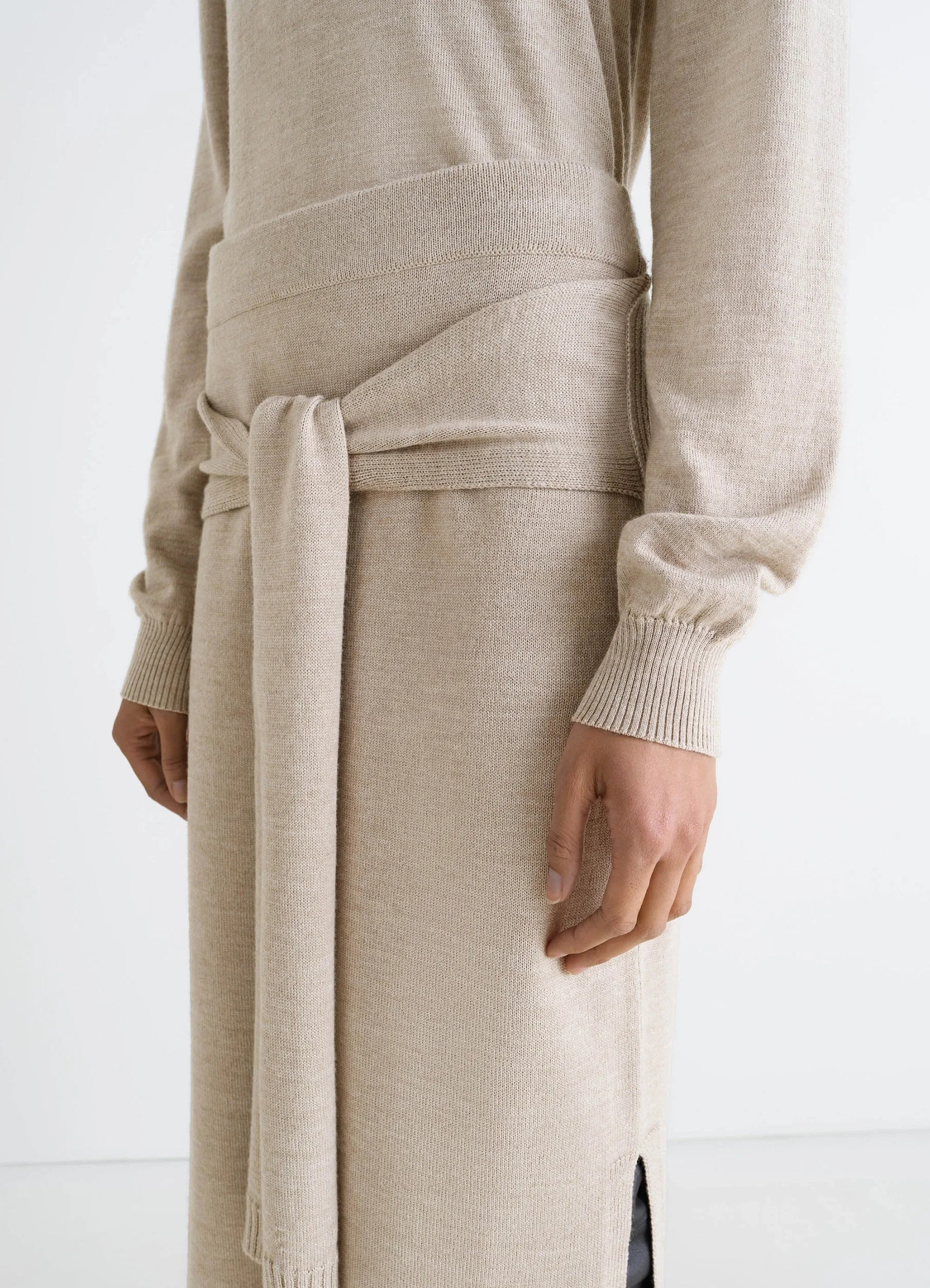 Lemaire trompe loeil skirt in beige blended merino wool, model shot, side detail shot sweater tie panels back