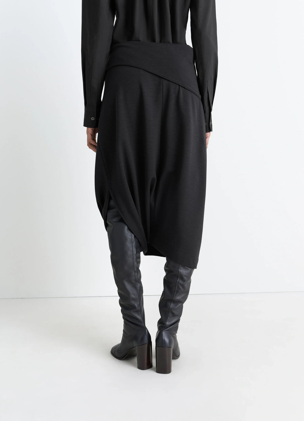 Lemaire Twisted Hem Dress in Black Wool Viscose-Blend, model shot, back view asymmetric waist