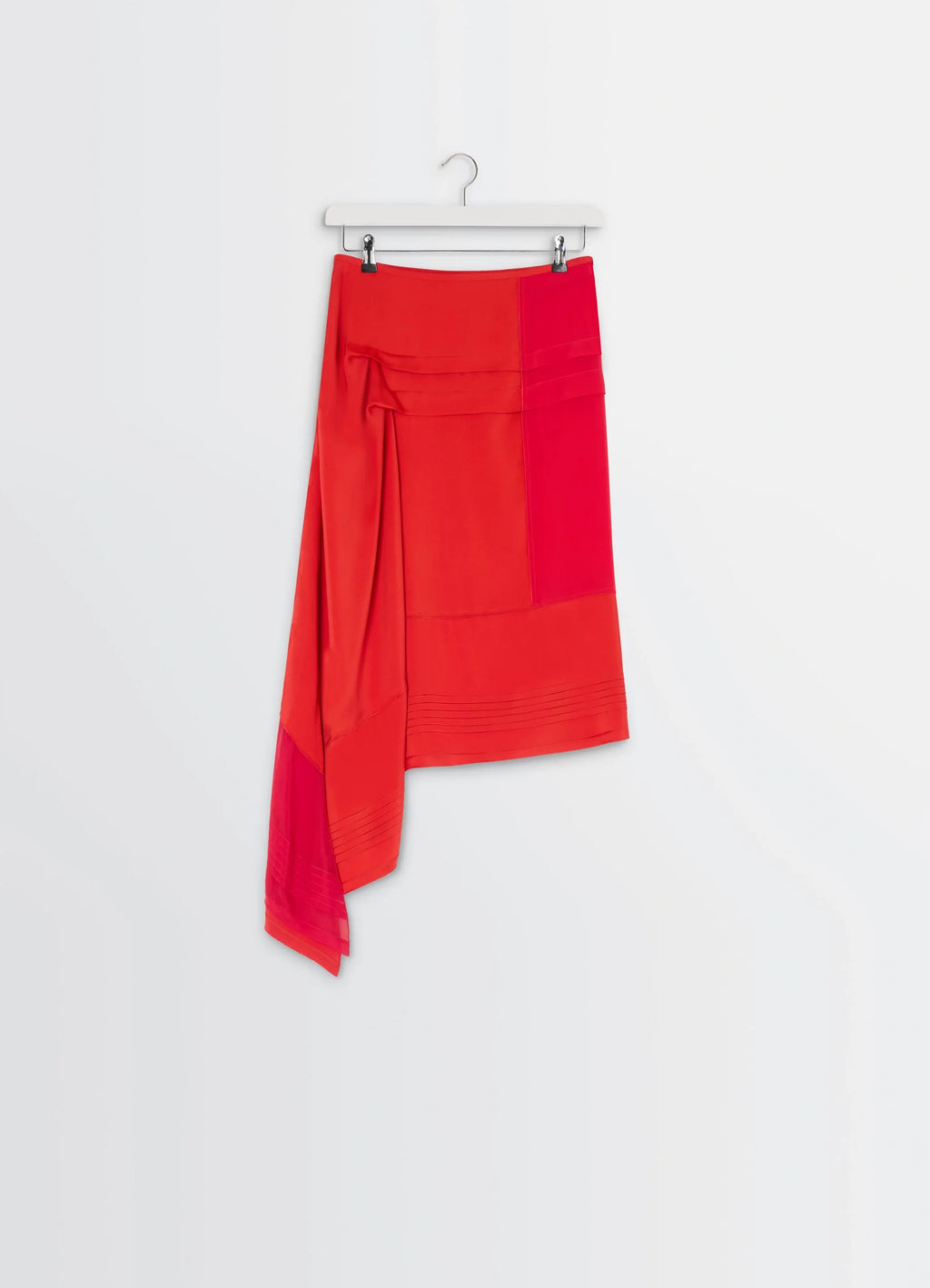 Skirt with Pleats in Patchwork of crêpe de Chine, product shot, hanging flat view flowing asymmetric drape
