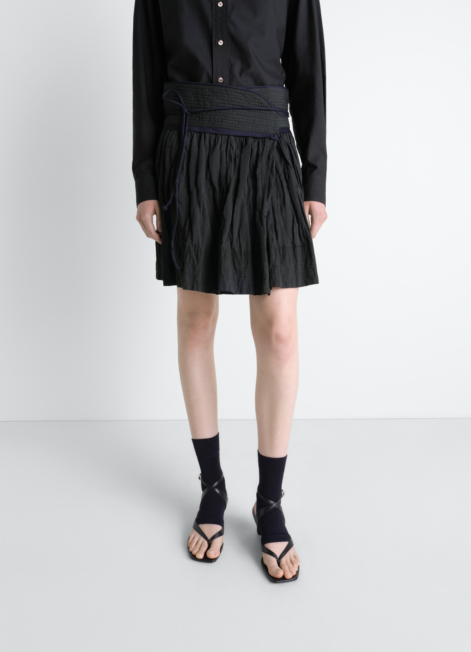 Crinkled wrap skirt in crinkled cotton metal, model shot, mid-length front view textured crinkled fabric