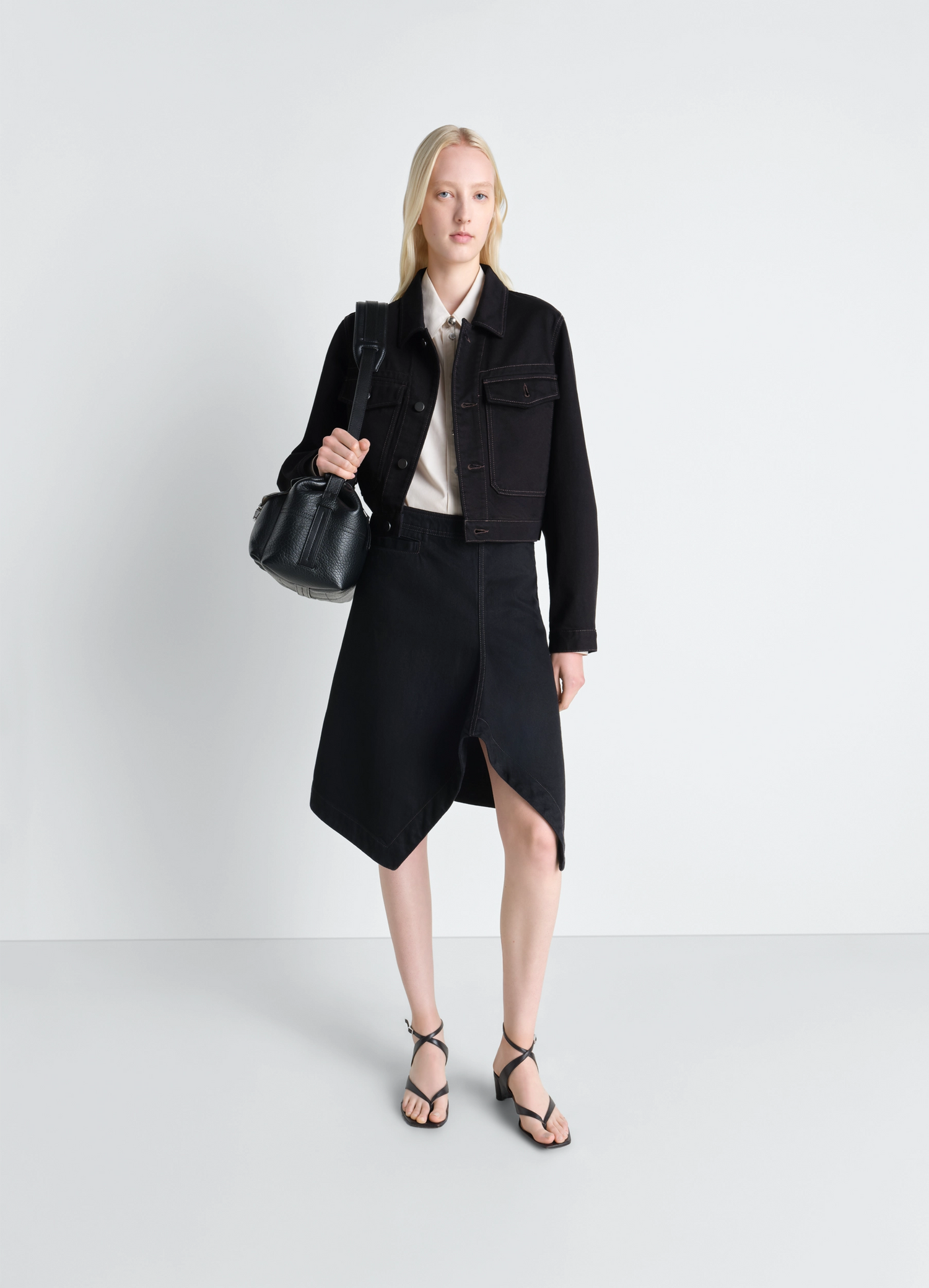 Asymmetric Skirt in Black Denim, model shot, Front View Asymmetrical Cut