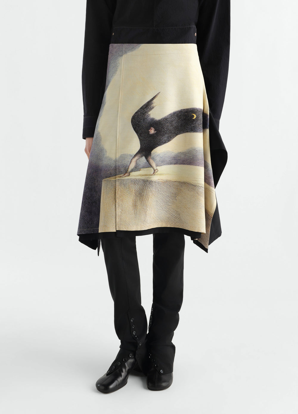 Skirt with "La Nuit Qui Marche" print in wool cloth beige and black worn by model front view LEMAIRE