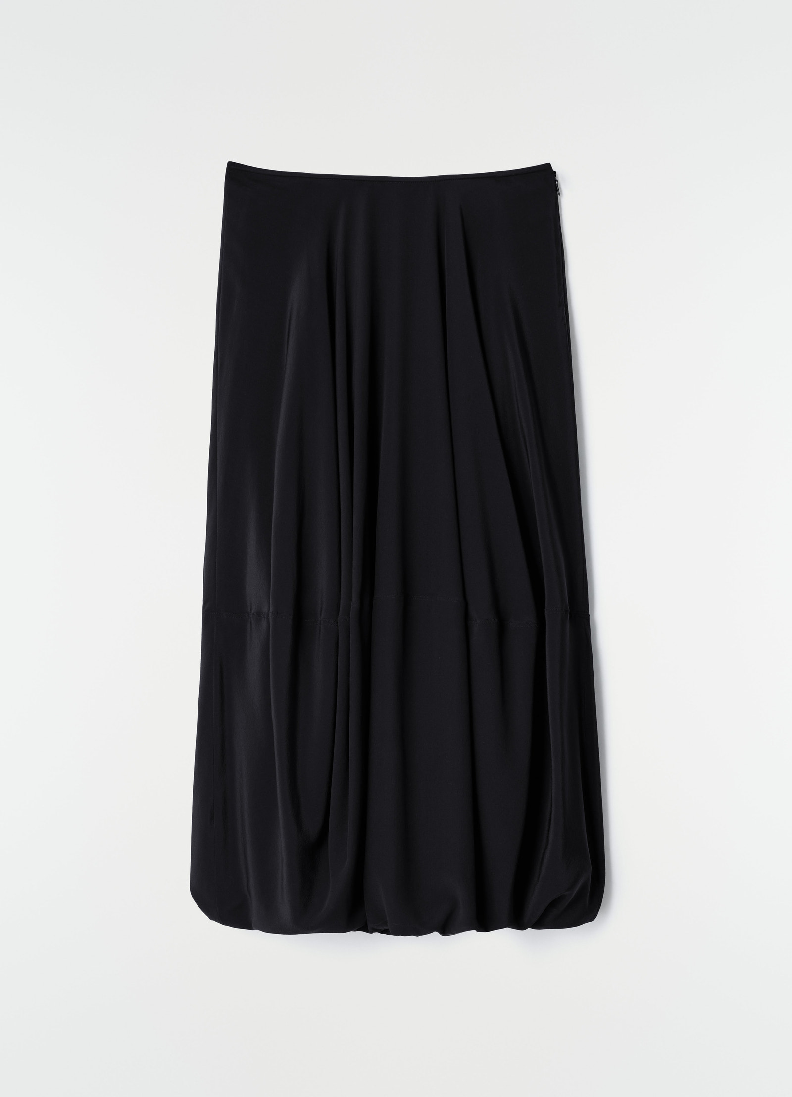 Balloon skirt in black silk crepe de chine by lemaire flat lay on white background
