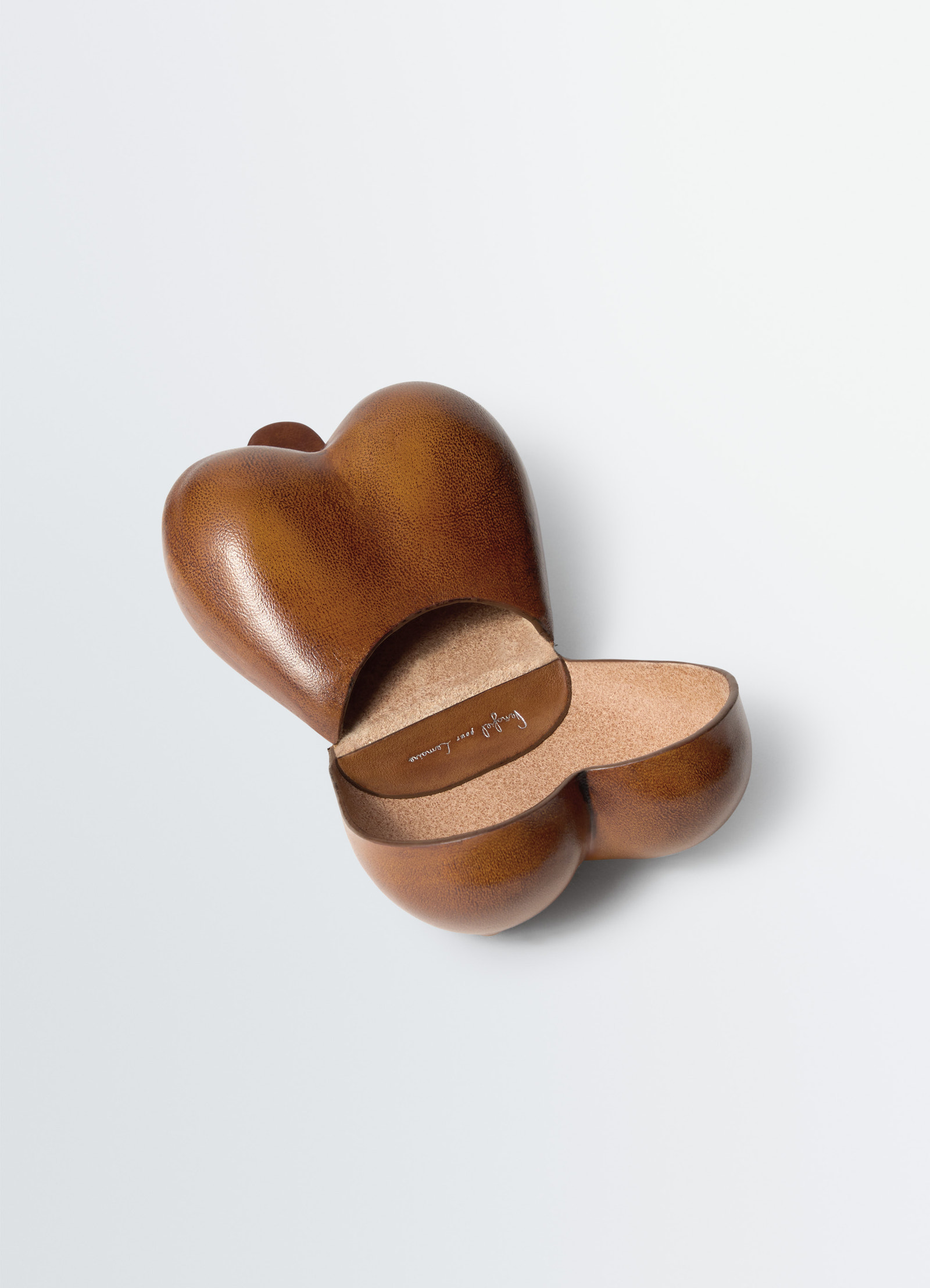 Carlos breasts coin purse in smooth patina leather, product shot, angled open view contrasting interior