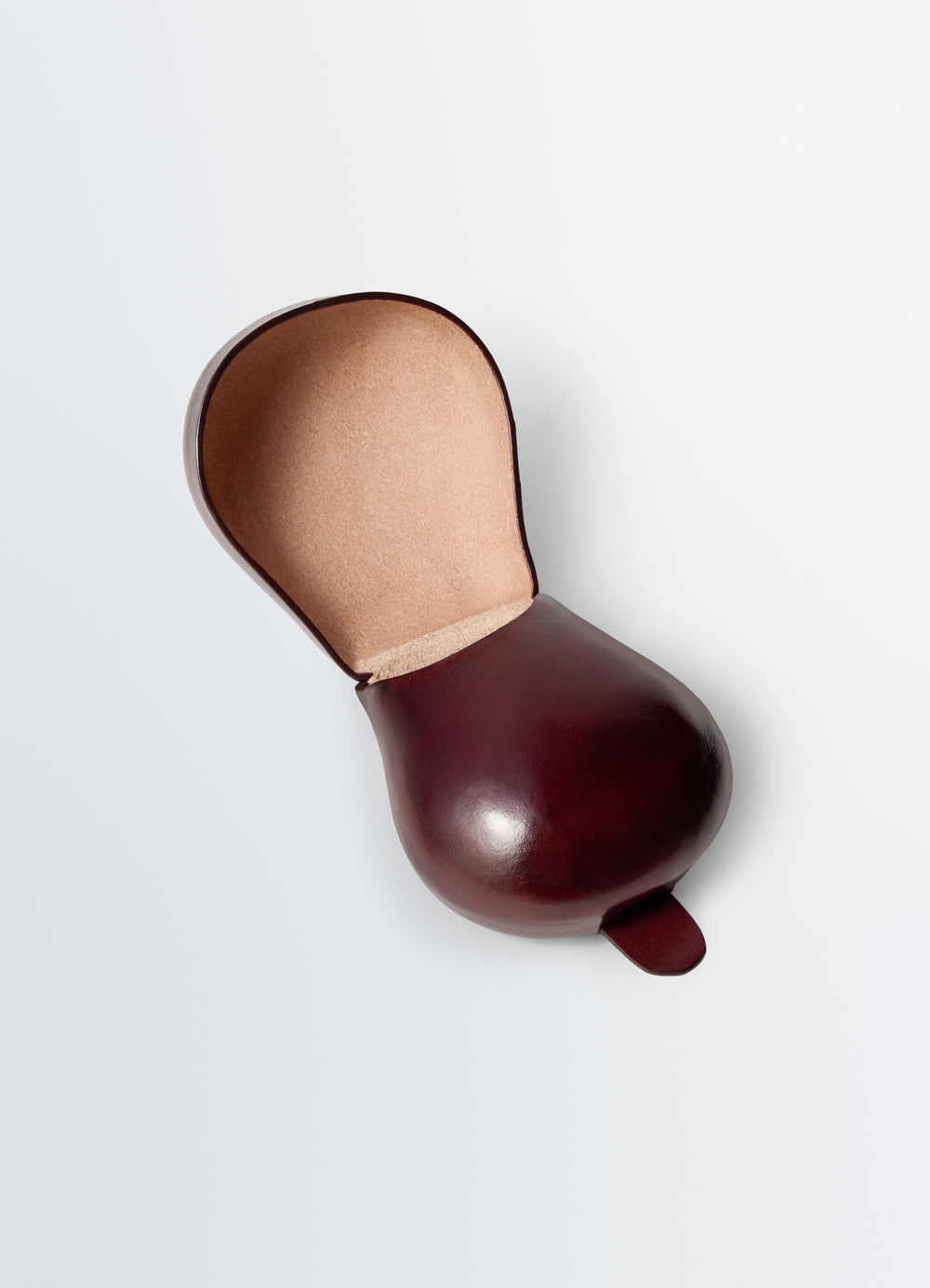 Carlos Castanet burgundy leather coin purse with beige suede interior by LEMAIRE on white background