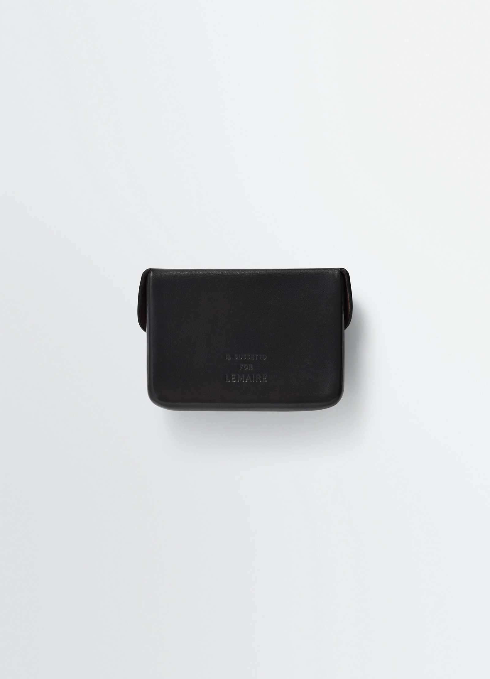 Il bussetto for lemaire card holder in black vegetable-tanned leather, product shot, back view compact structured design