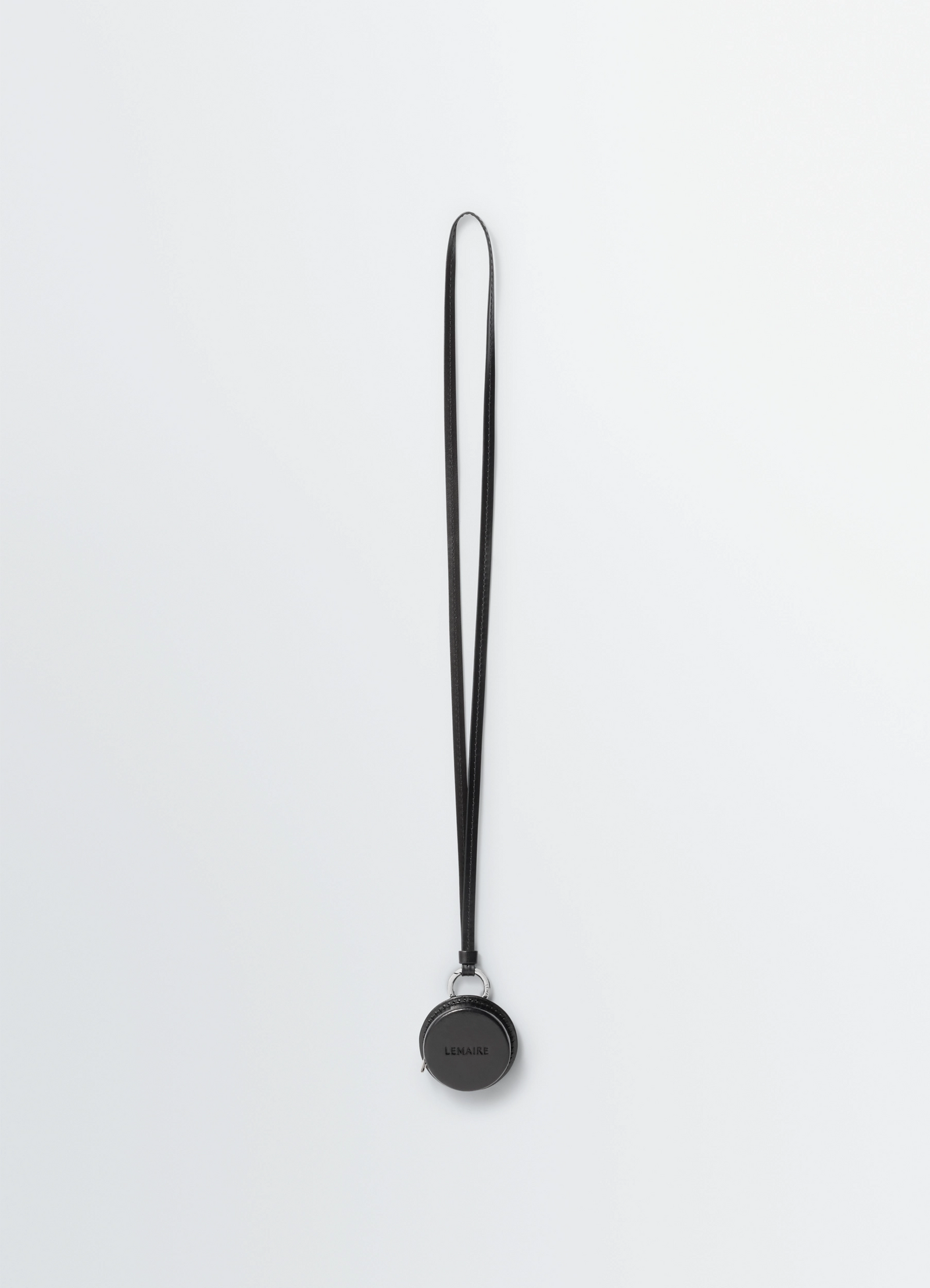 Molded tape necklace in silver lwg-certified leather, product shot, front view sculptural lightweight