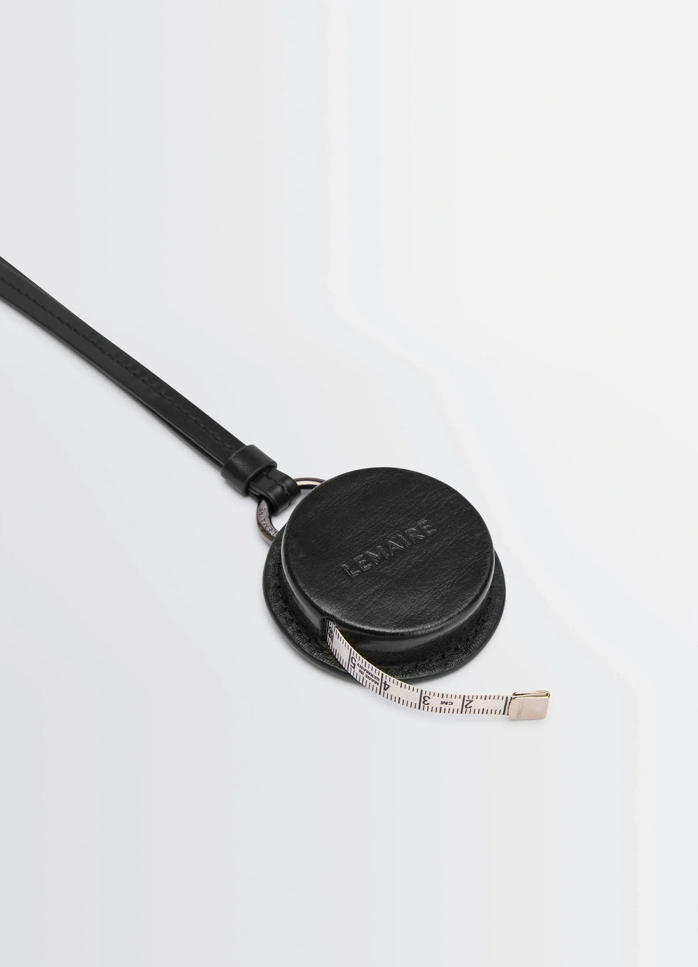 Molded Tape Necklace in Patinated Silver Leather, product shot, angled top view minimalist detachable strap