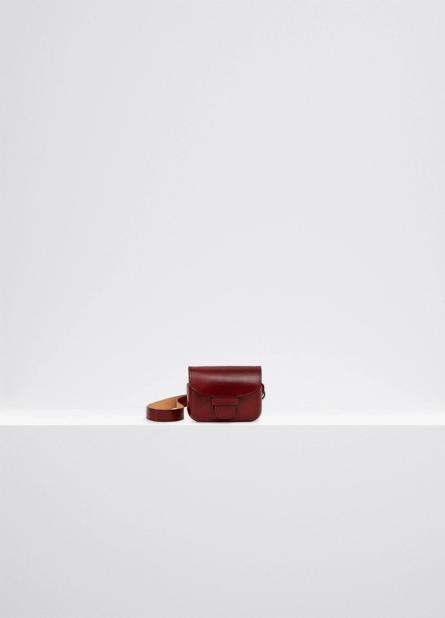 Il bussetto for lemaire airpods pro in vegetable-tanned cowhide, product shot, back view folded strap detail