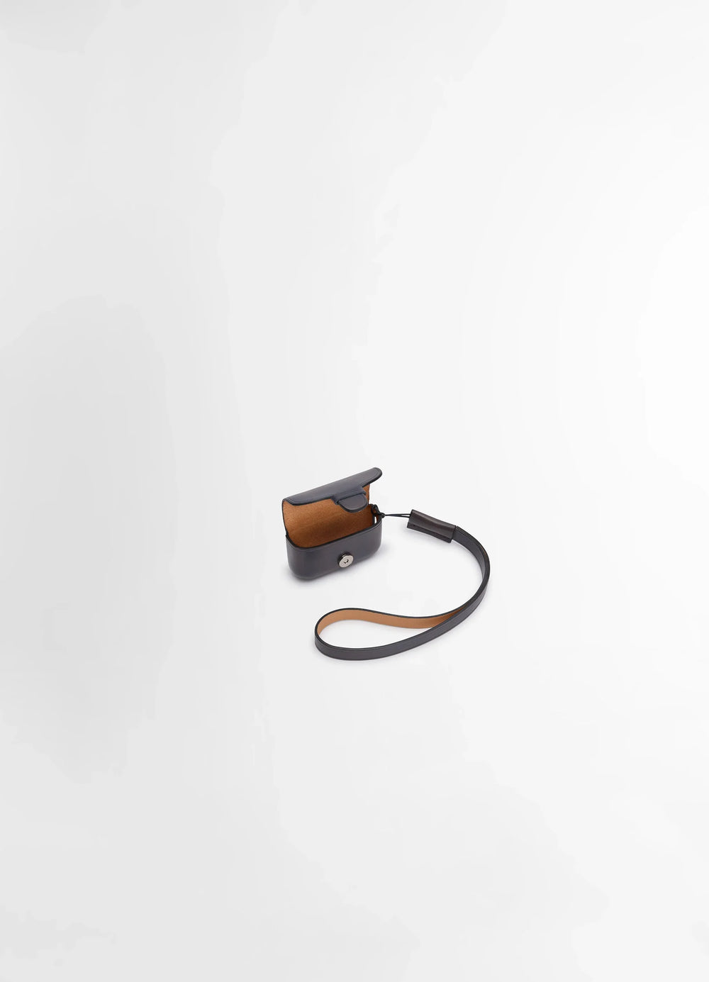 IL BUSSETTO FOR LEMAIRE AIRPODS PRO in vegetable-tanned cowhide, product shot, side view open flap with strap