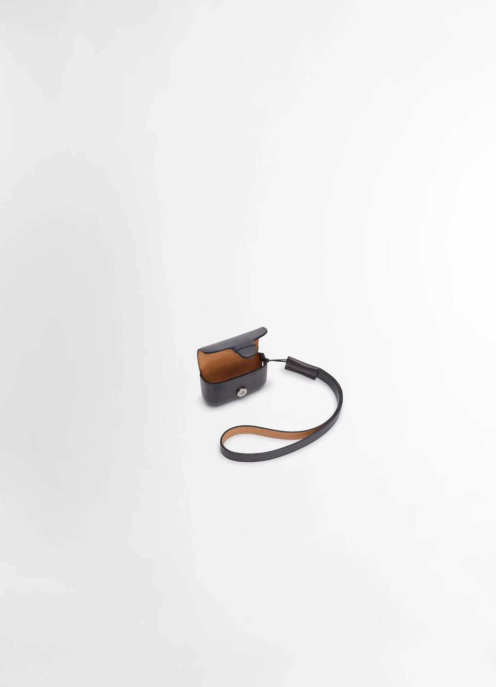 IL BUSSETTO FOR LEMAIRE AIRPODS PRO in vegetable-tanned cowhide, product shot, side view open flap with strap