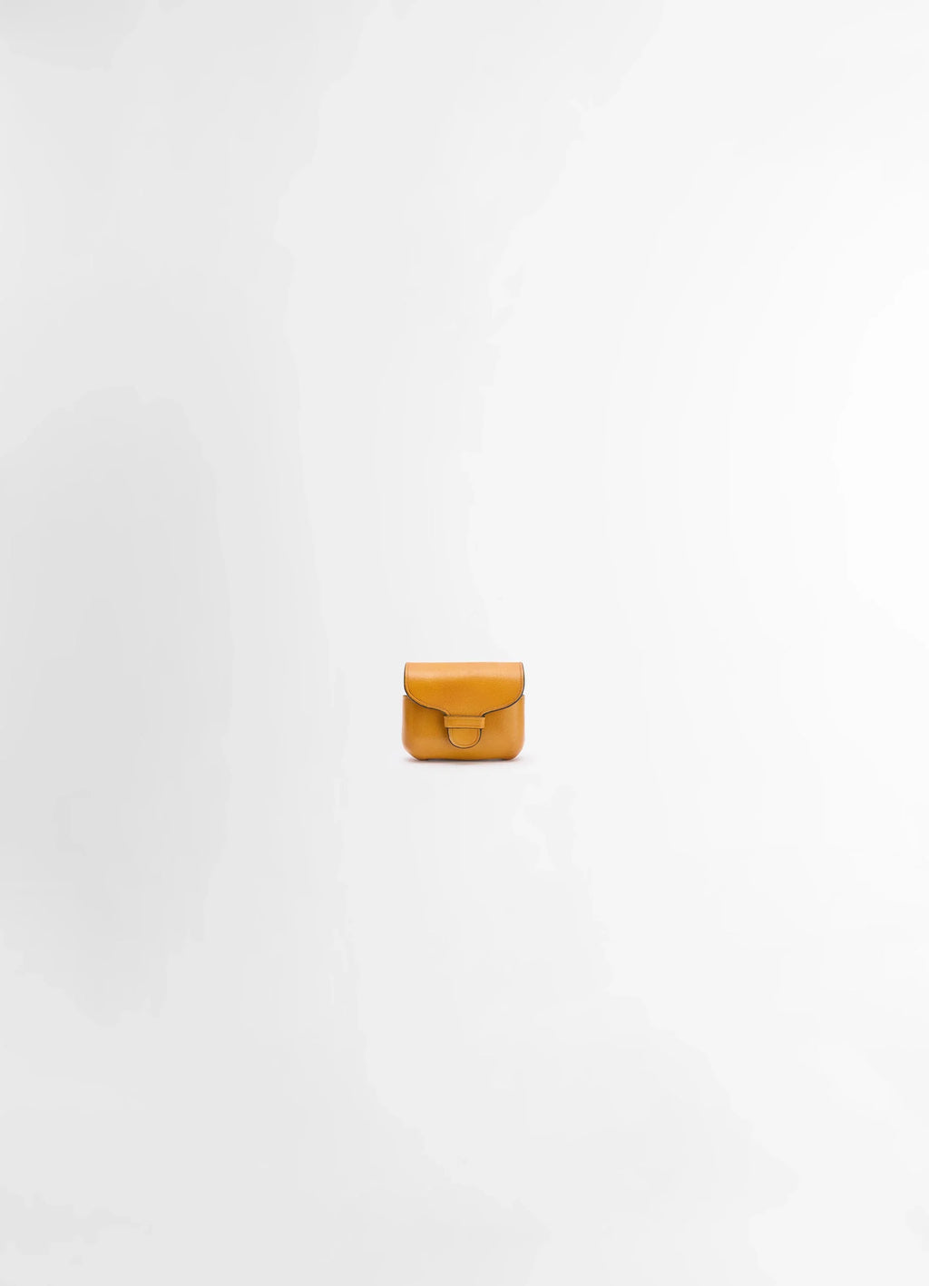 Il Bussetto for Lemaire AirPods Pro in vegetable-tanned cowhide, product shot, front view compact smooth finish