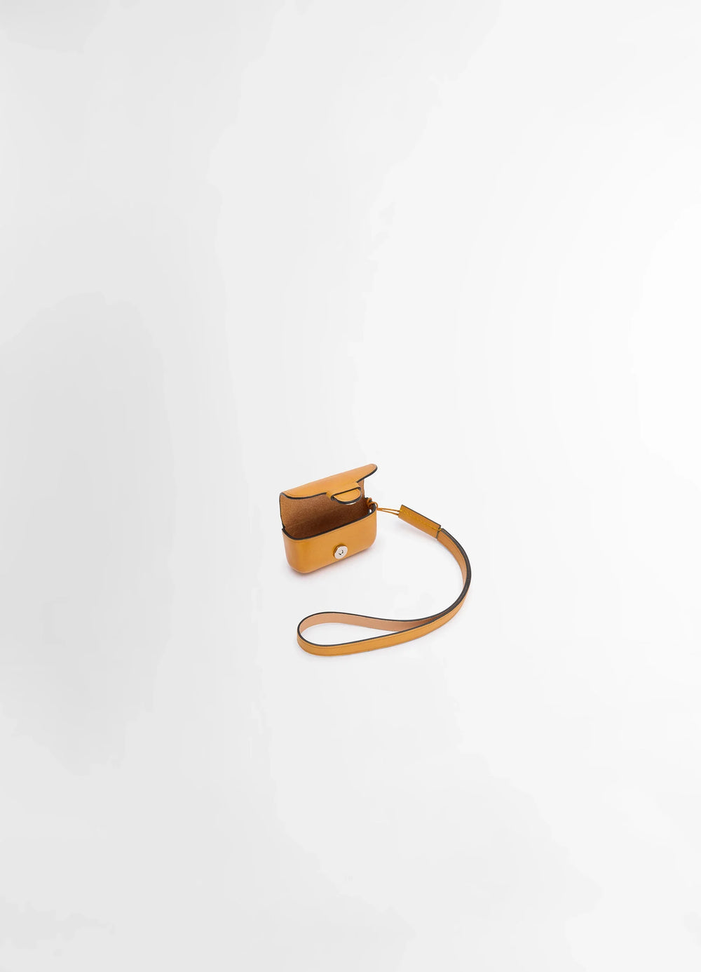 Il Bussetto for Lemaire AirPods Pro in vegetable-tanned cowhide, product shot, top side view open flap with strap