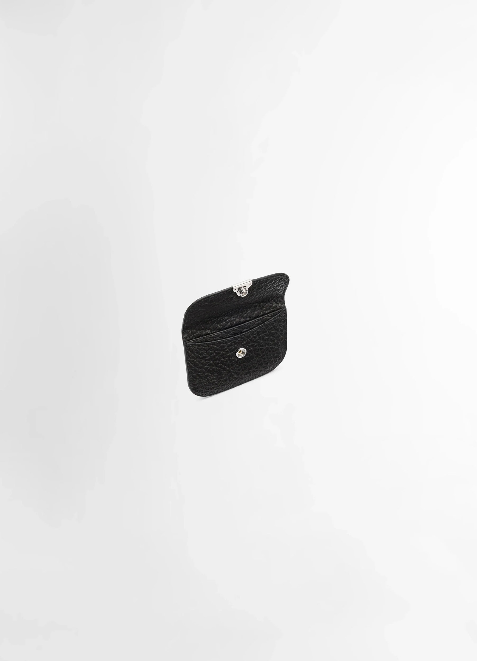 Lemaire soft tab card holder in large grained cow leather, product shot, angled open view exposed snap button