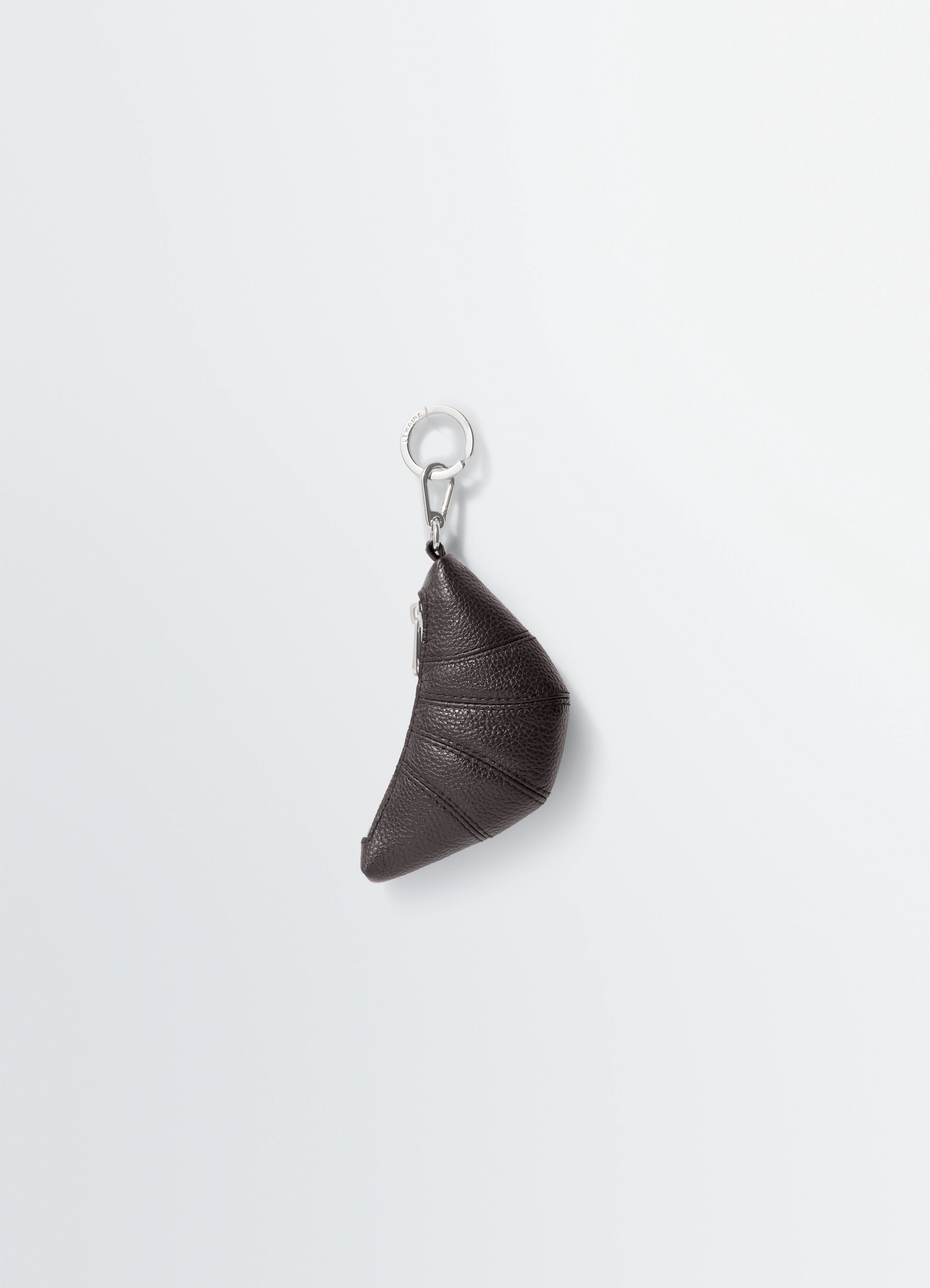 Mini croissant keyring in grained leather, product shot, side view half-moon shape