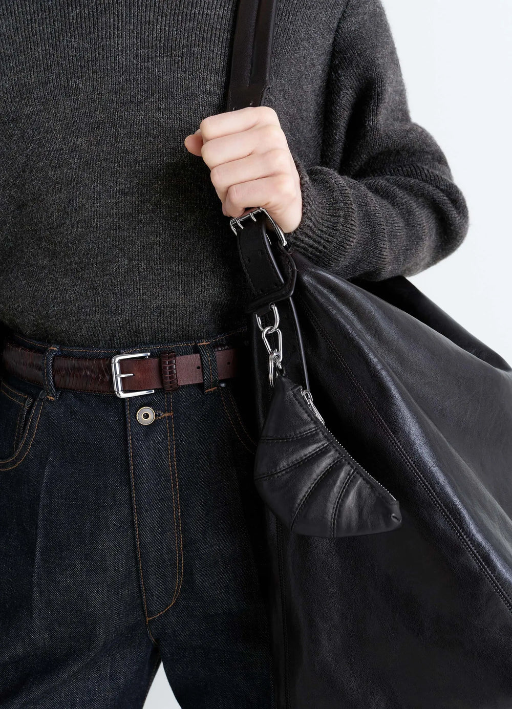 Mini Croissant Keyring in Black Nappa Leather, Detail shot Folded half-moon design