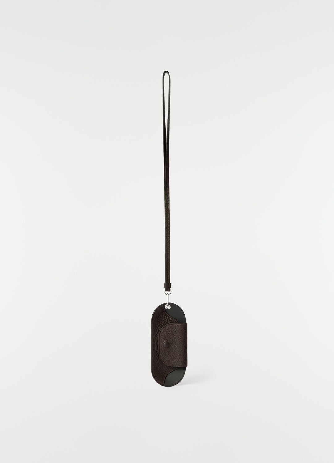 Glasses case in dark brown glossy vegetable-tanned leather with strap by LEMAIRE front on white background