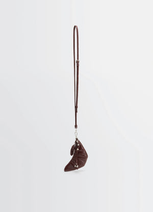 Crossbody Croissant Coin Purse in Coated Cotton Canvas, product shot, Side view Half-moon shape, infinity charm