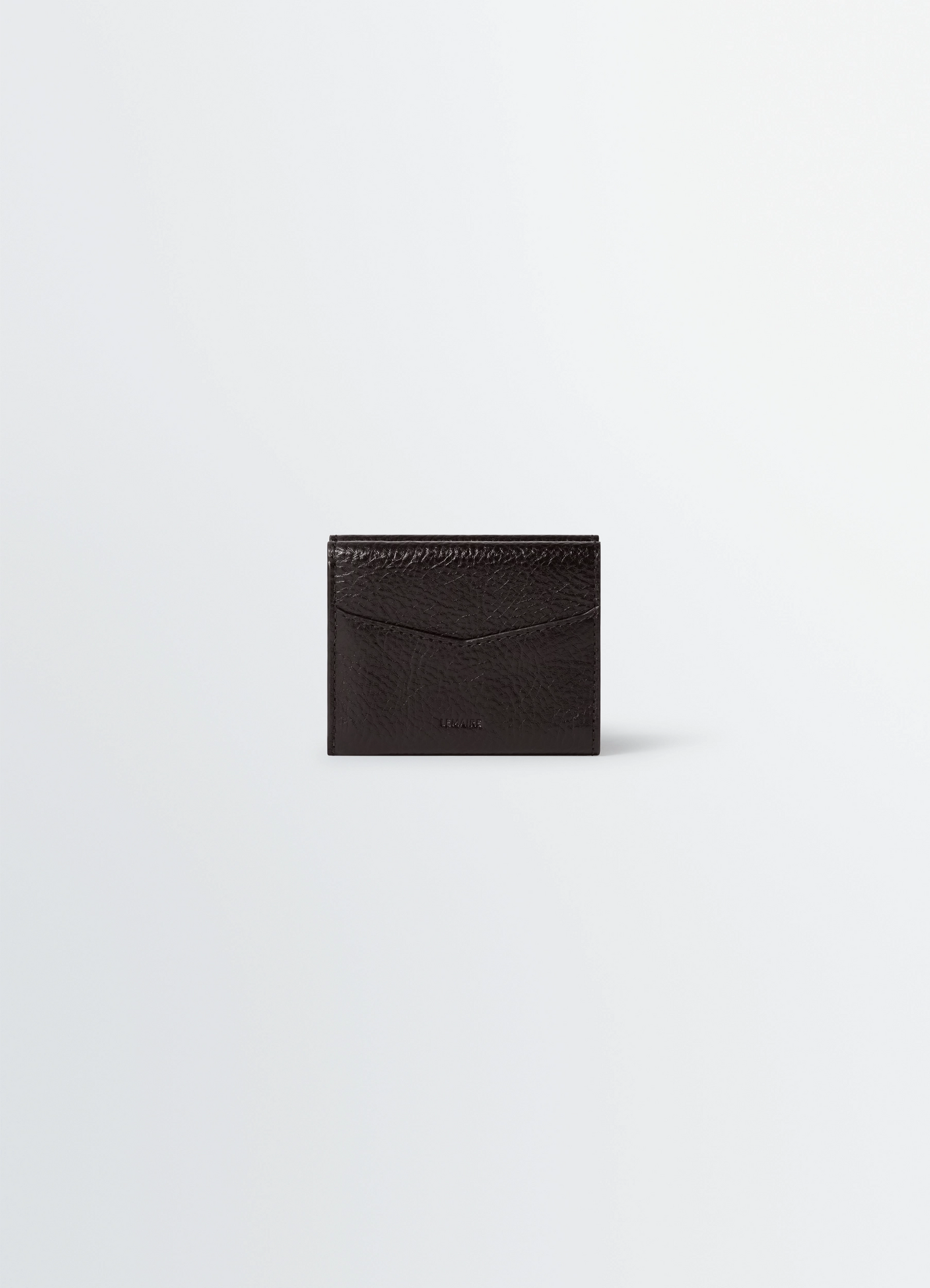 Gear trifold wallet in glossy vegetable-tanned leather, product shot, back view slender profile