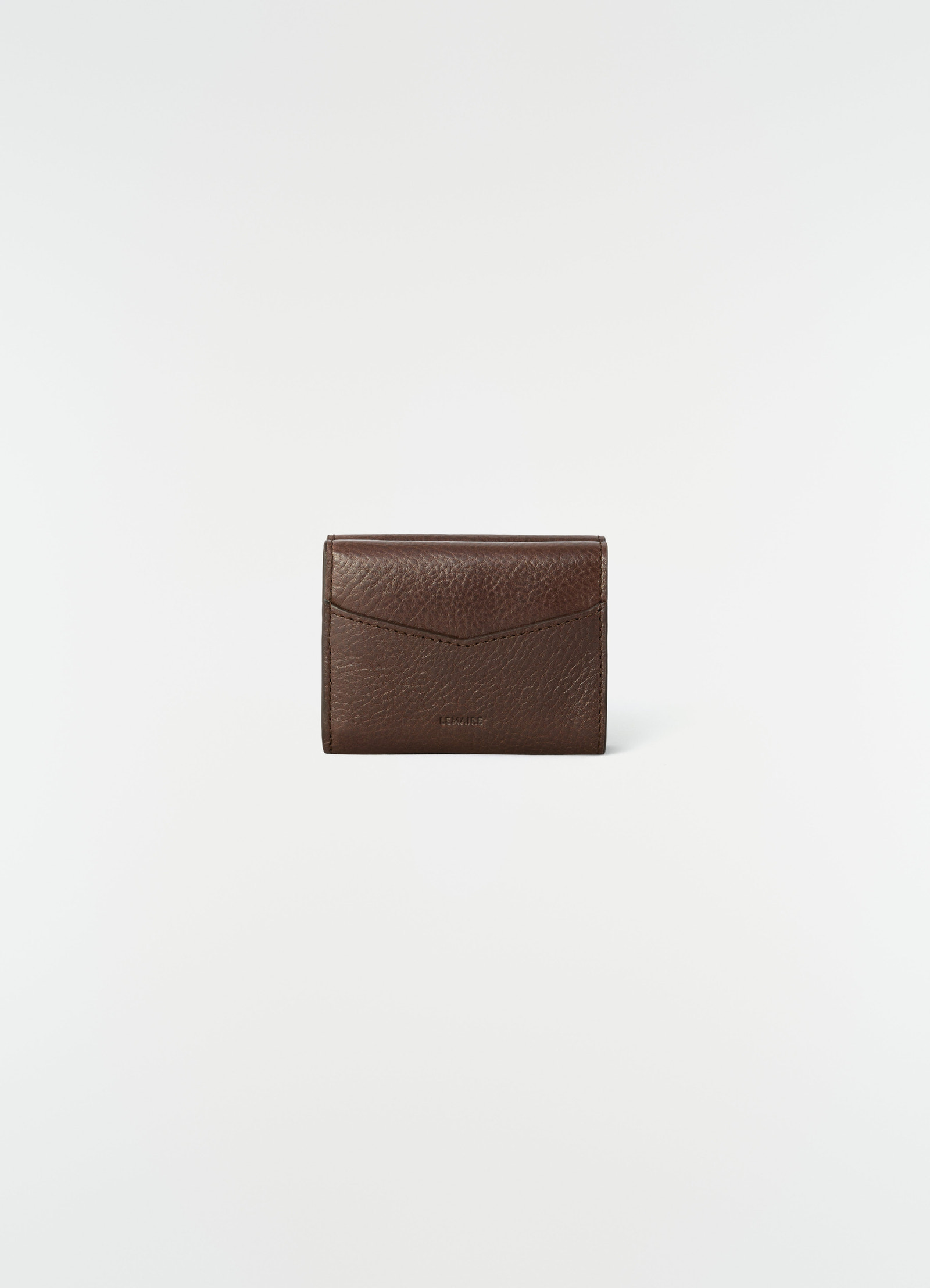 Gear trifold wallet in brown grained leather by lemaire front view on plain white background