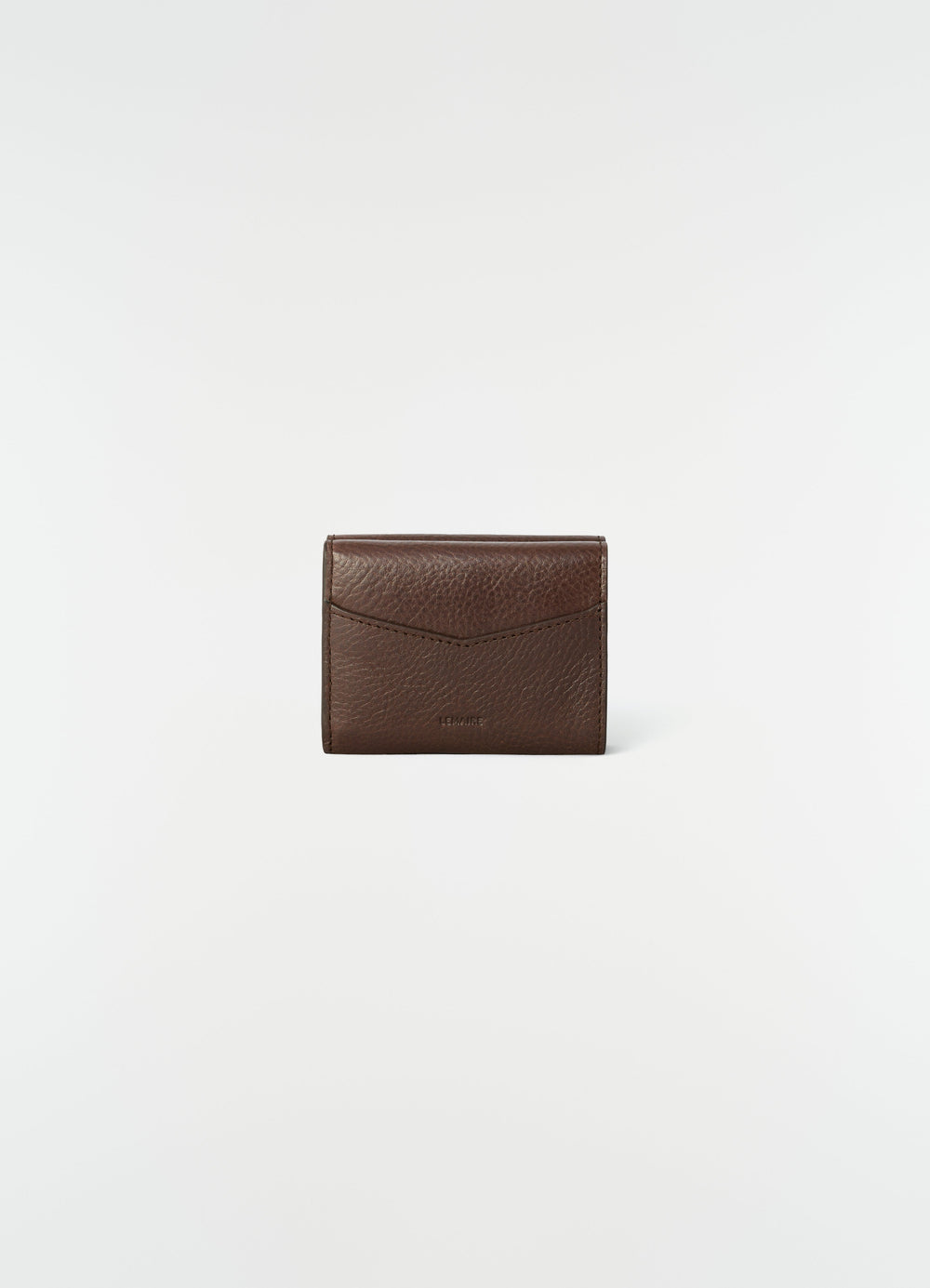 Gear trifold wallet in brown grained leather by LEMAIRE front view on plain white background