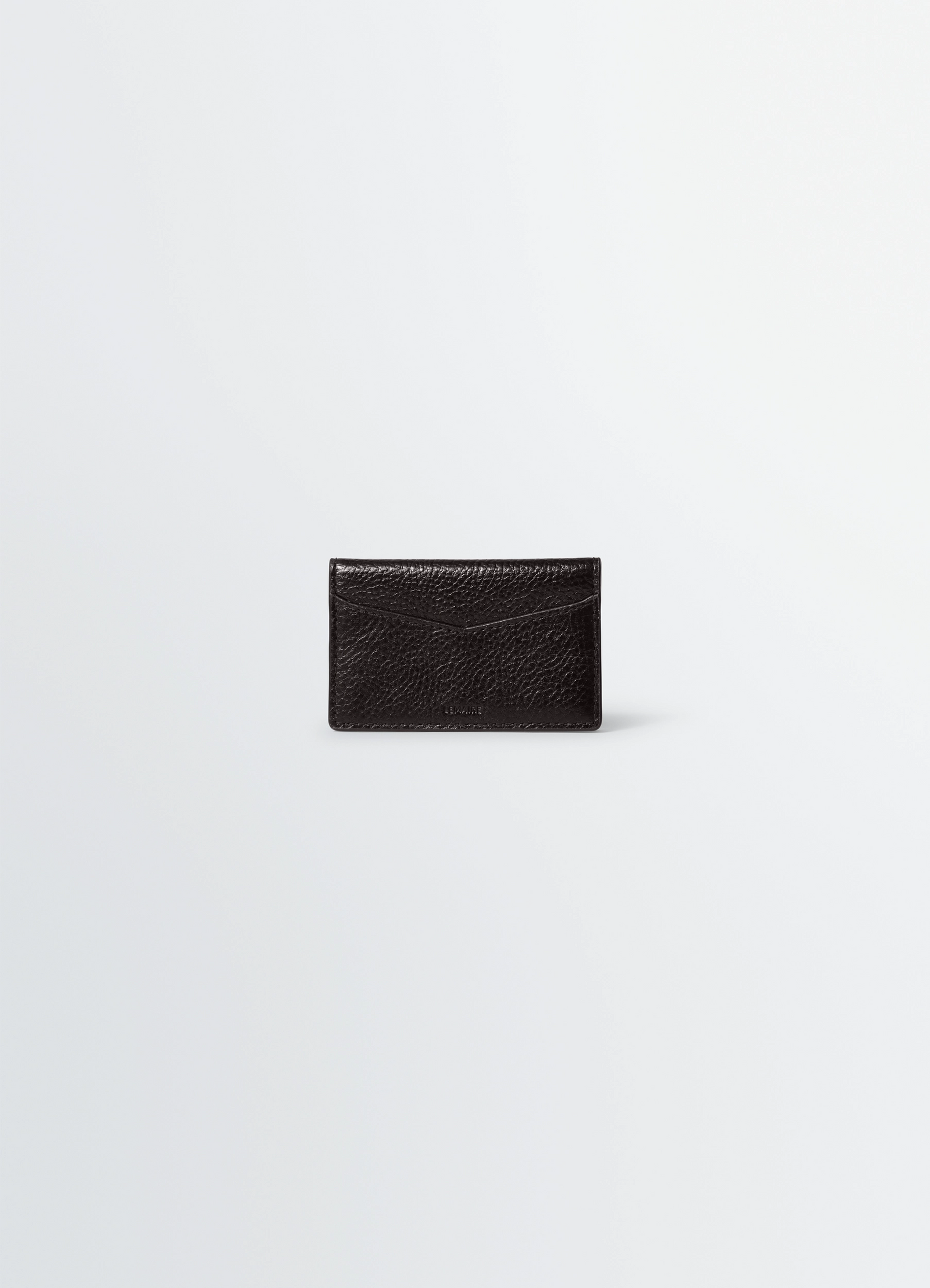 Gear pocket organizer in glossy vegetable-tanned leather, product shot, back view textured leather finish