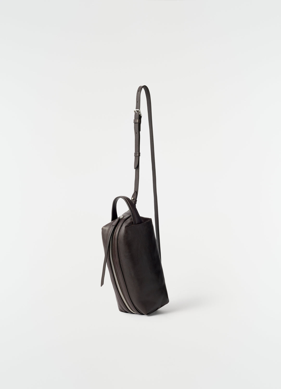 Small black nappa lambskin Care Bag with silver zipper and adjustable strap by LEMAIRE on plain white background