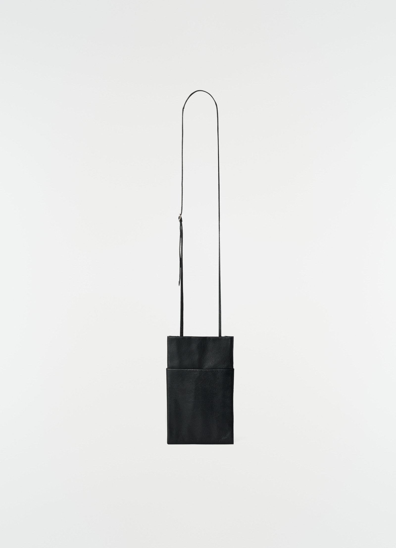 Book pouch black grained leather lemaire front view with long strap on white background