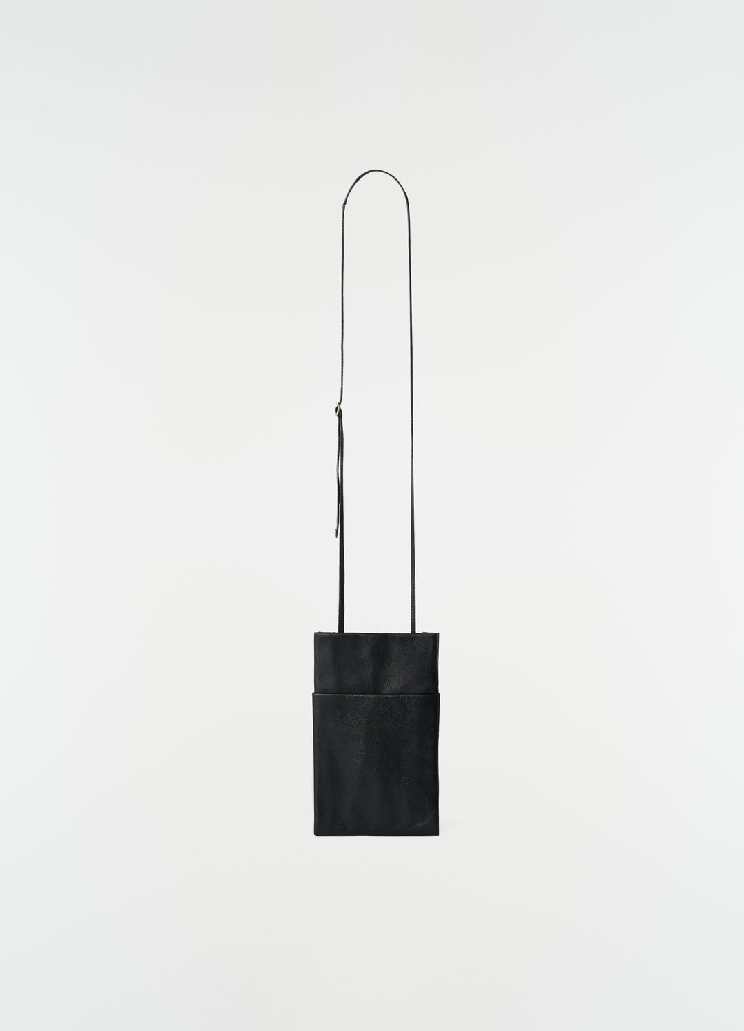 Book pouch black grained leather LEMAIRE front view with long strap on white background