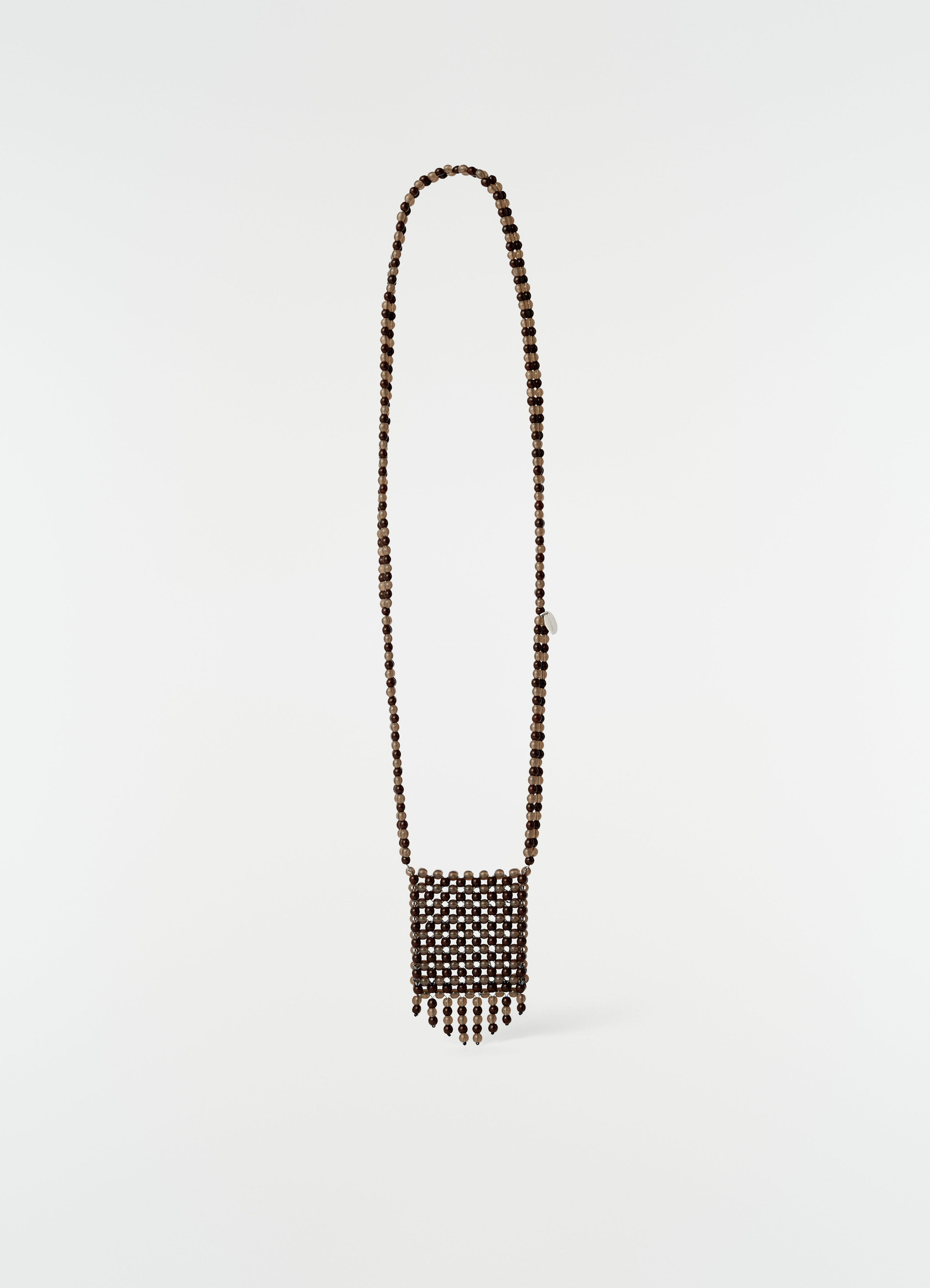 Grigri bag necklace by lemaire in dark brown resin beads with fringe detail on plain white background
