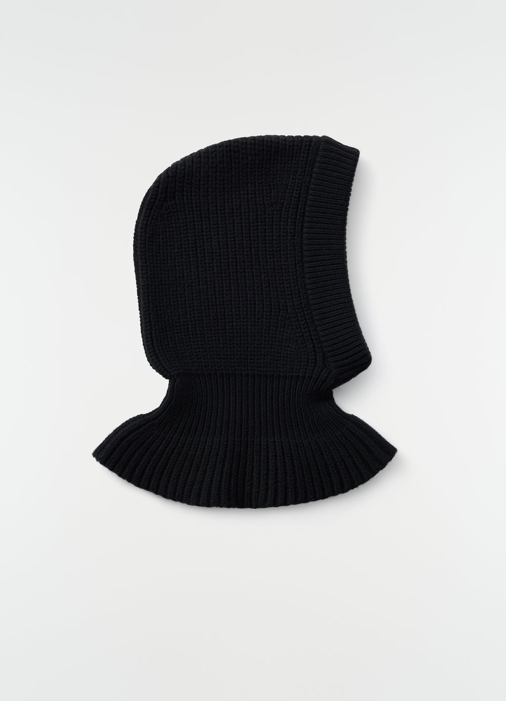 Balaclava in black worsted wool with flared neck hem LEMAIRE flat lay on white background