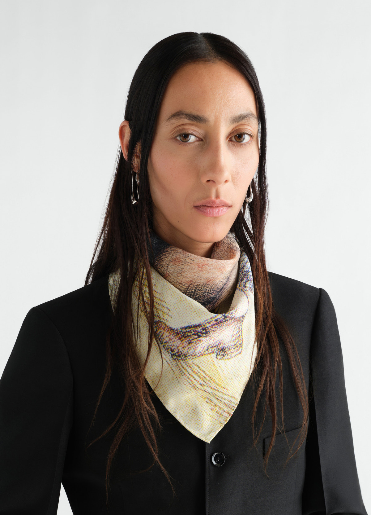 Printed “les amoureux” silk blend scarf in beige and black worn by model front view lemaire
