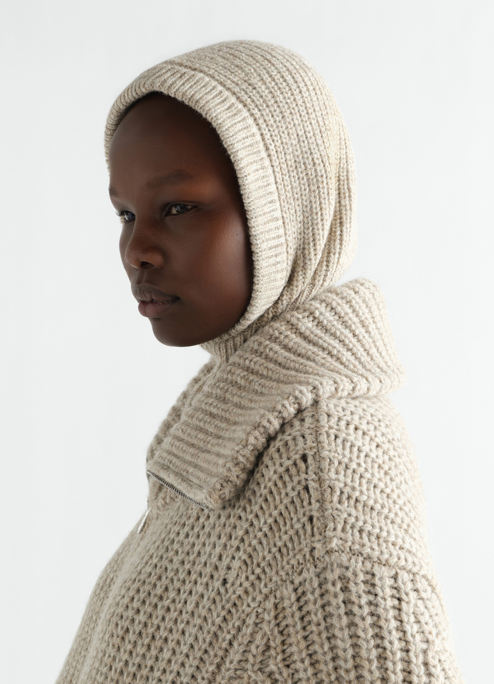 Balaclava in beige alpaca and yak wool blend by lemaire worn by model side view close-up detail