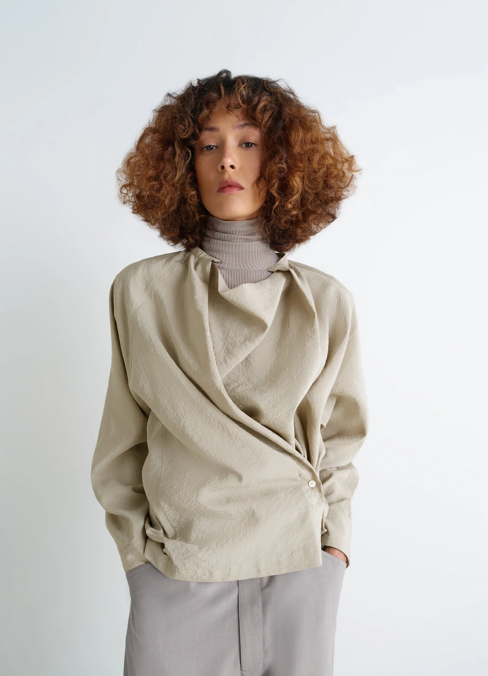 Lemaire Twisted Top in Dry Silk Blend, model shot, three-quarter view asymmetrical drape