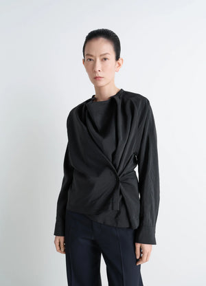 Lemaire Twisted Top in Black Dry Silk Blend, model shot, front view long-sleeved fitted cut
