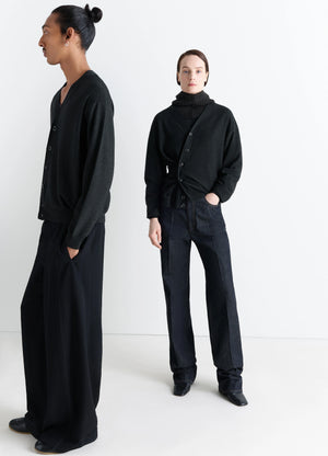 Lemaire Relaxed Twisted Cardigan in Blended merino wool, model shot, Front and side view Asymmetrical button placket