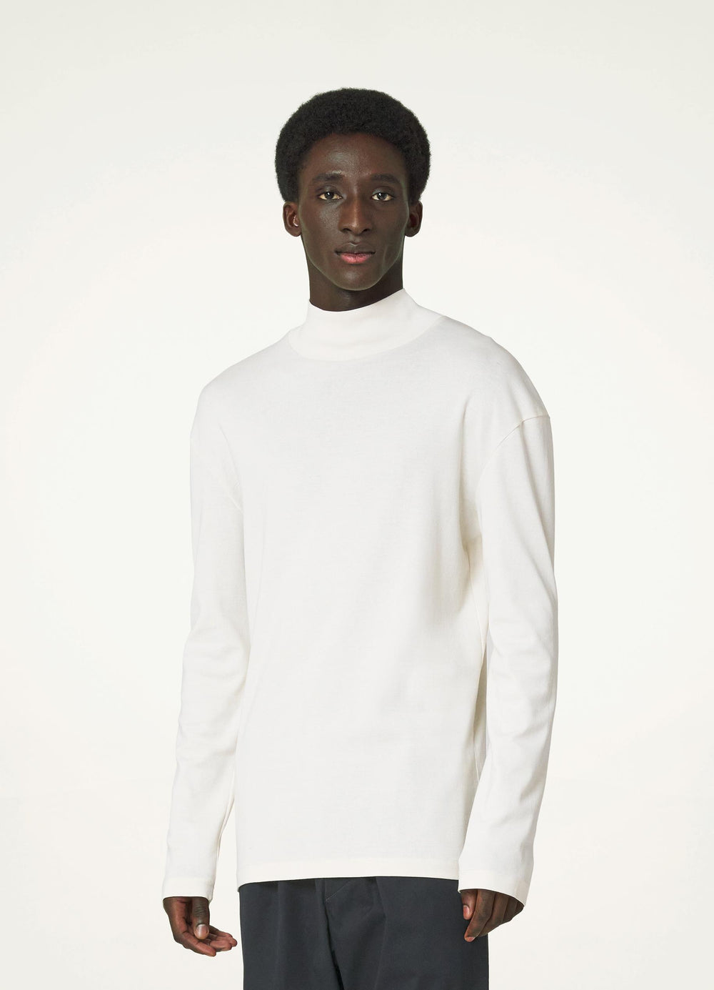 Long Sleeve Rib Turtleneck in White Mid-Weight Jersey, model shot, Front view Fitted cut, high roll-neck