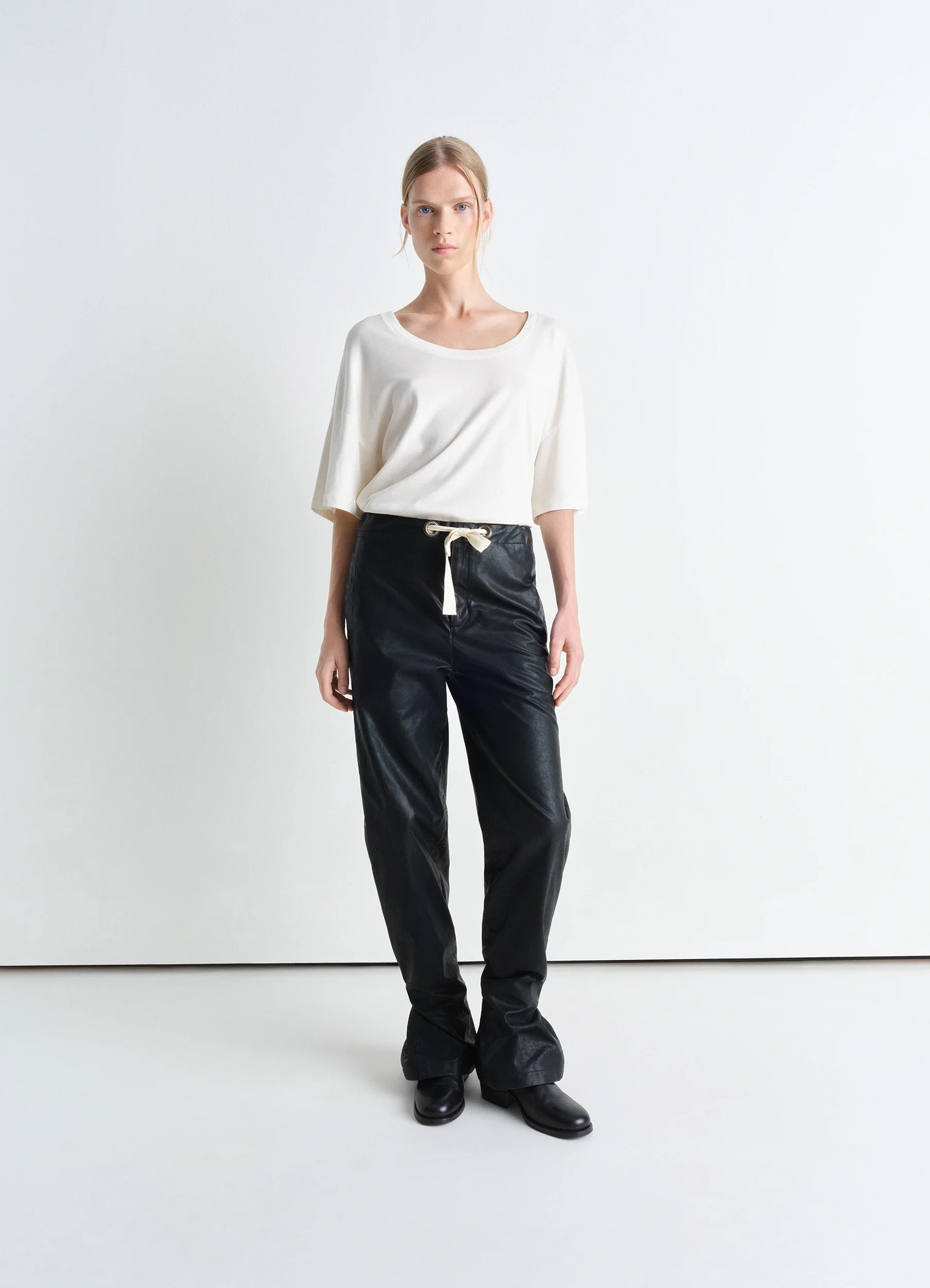 Lemaire rib collar t-shirt in mid-weight cotton jersey, model shot, full body view half sleeve, relaxed fit