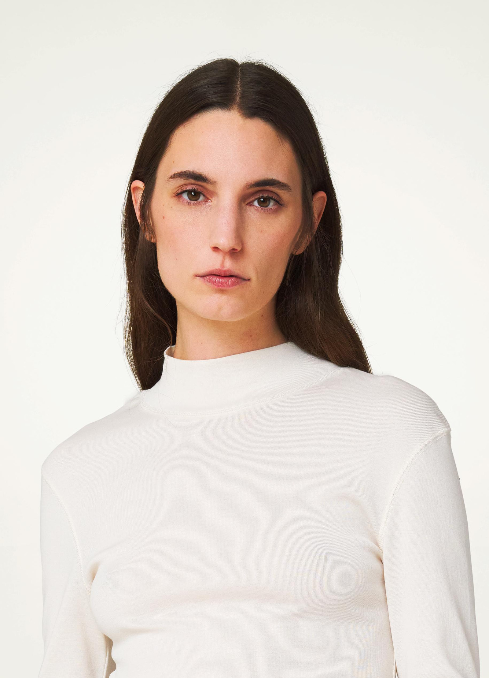 Rib turtleneck in mid-weight jersey, model shot, close-up view mock neck detail