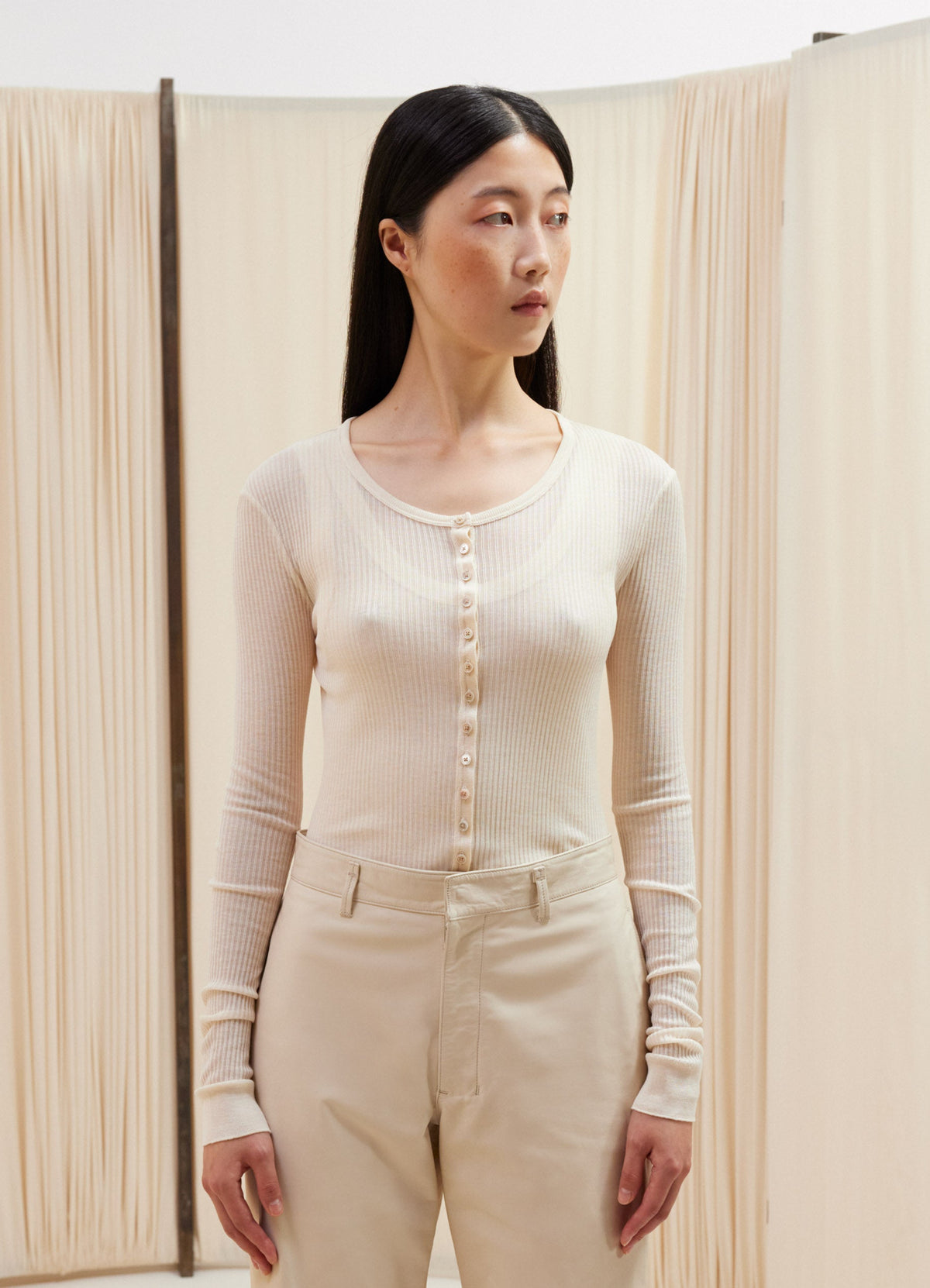 Lemaire Seamless Rib Top with Butto in N/A viscose and silk blend, model shot, front side view fitted cut, rib finish