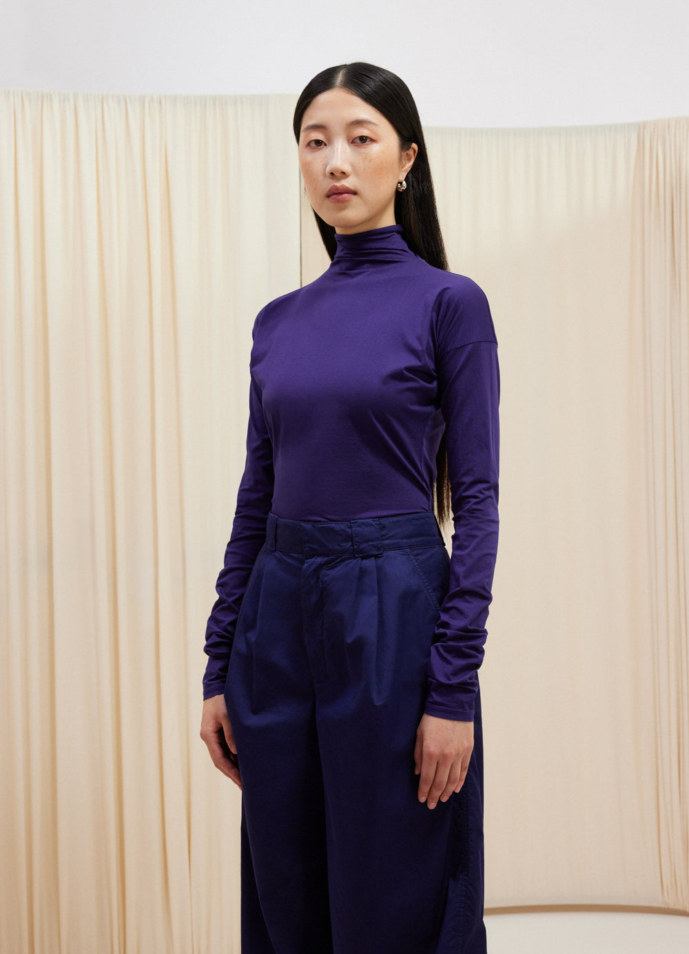 Lemaire Second Skin High Neck T-Shi in Purple Cotton Jersey, model shot, Front view Fitted shape, minimal details