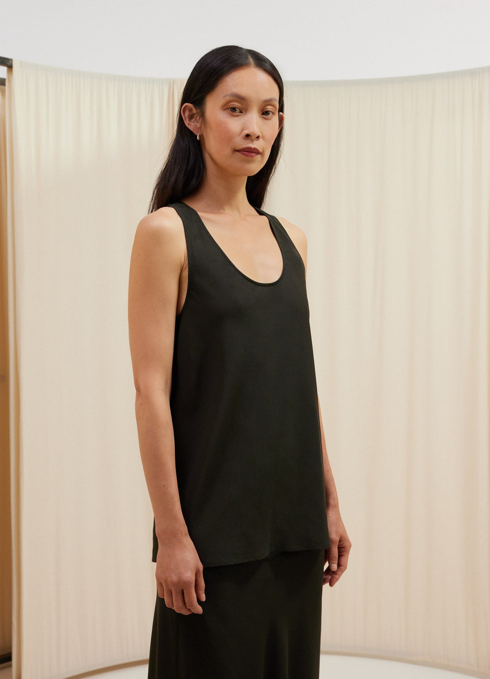 Lemaire Bias-Cut Tank Top in Soft sheen lyocell, model shot, Front side view Deep scoop neck