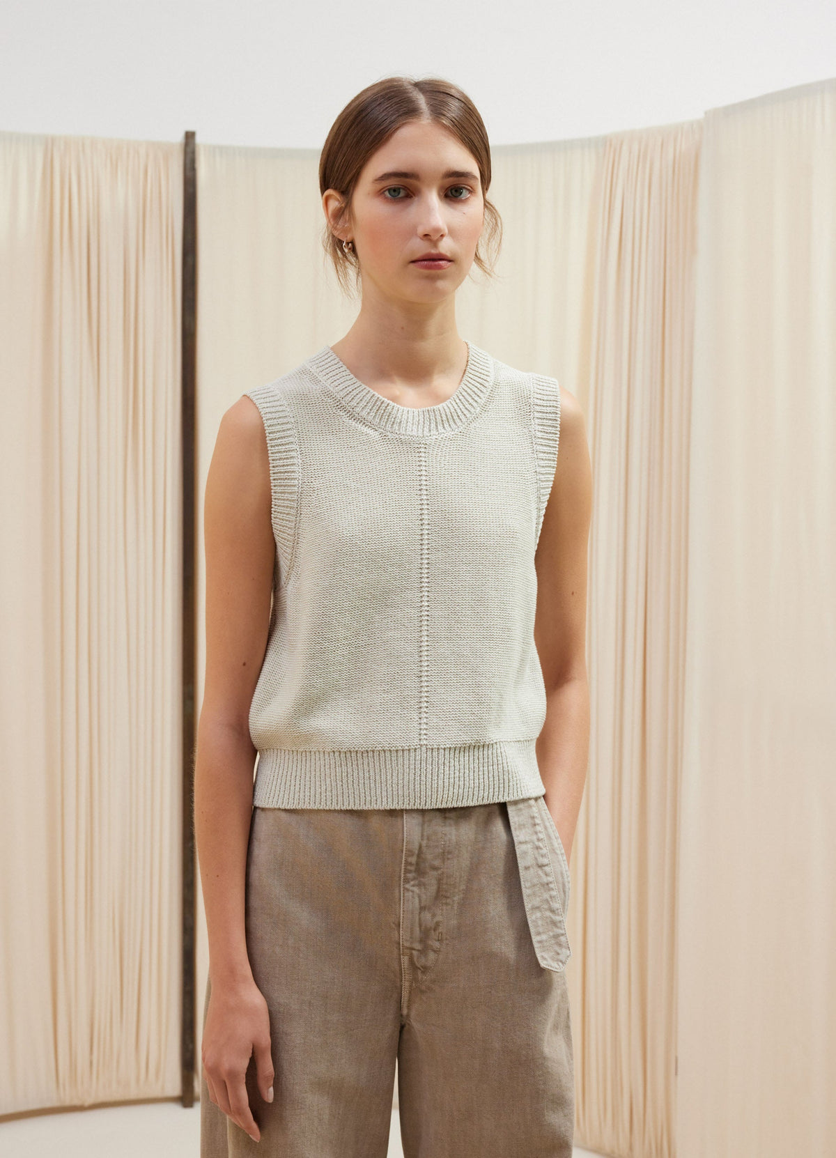 Lemaire Sleeveless Cropped Sweater in Silky Pima Cotton, model shot, Front view Fitted cut with crew neck