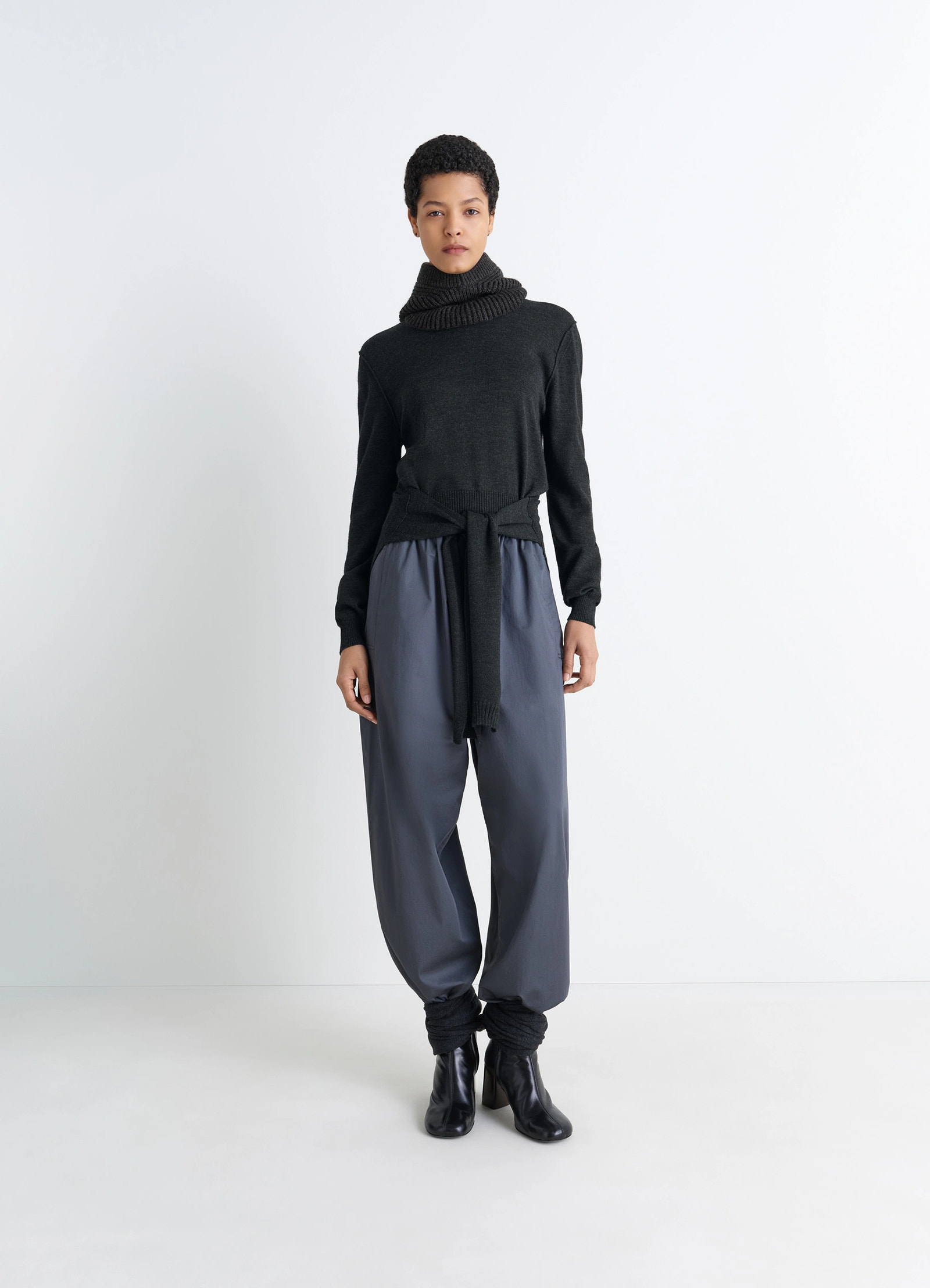 Lemaire trompe loeil jumper in blended merino wool, model shot, full body view turtleneck styling