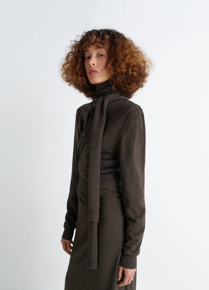Lemaire Twisted Cardigan in Blended Merino Wool, model shot, Side view Asymmetrical placket