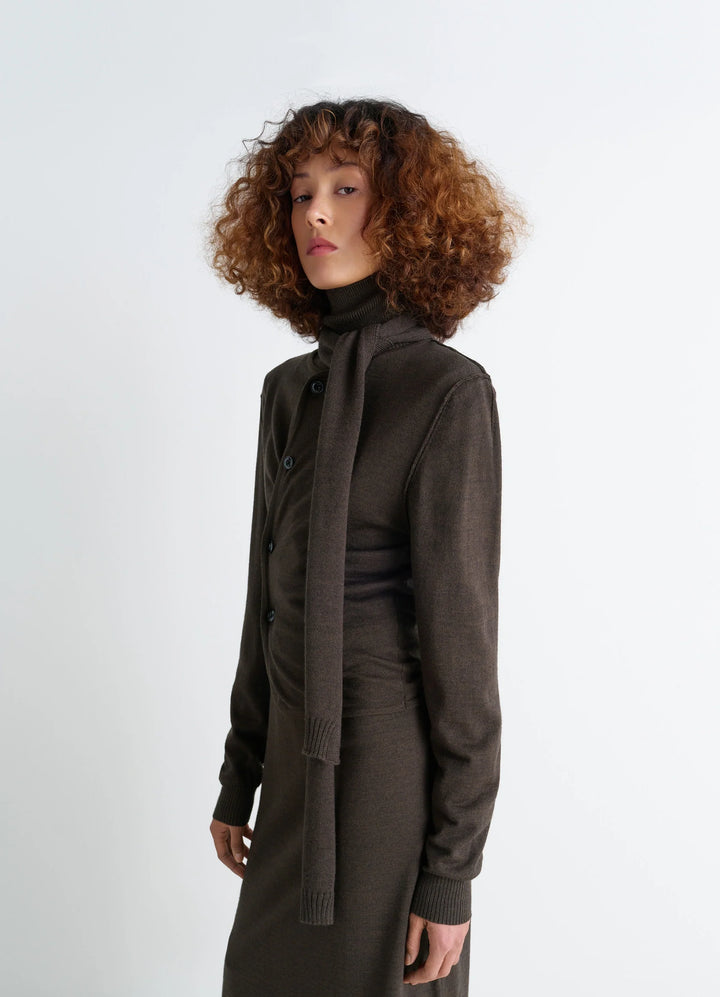 Lemaire Twisted Cardigan in Blended Merino Wool, model shot, Side view Asymmetrical placket